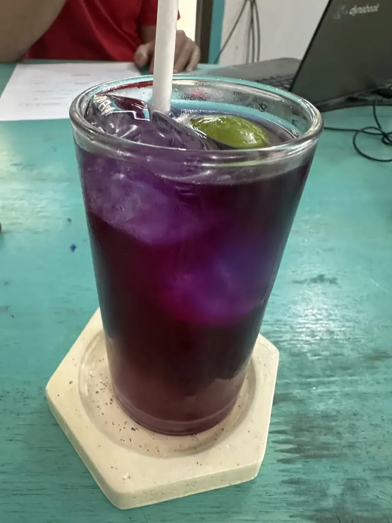 A purple butterfly pea flower drink at the Baan Kiao Resort restaurant, Haad Yao