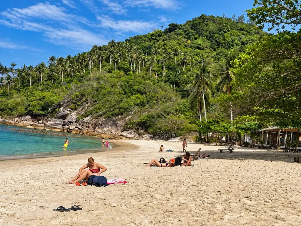 Bottle Beach - a stretch of sand ringed by green hills in north Koh Phangan