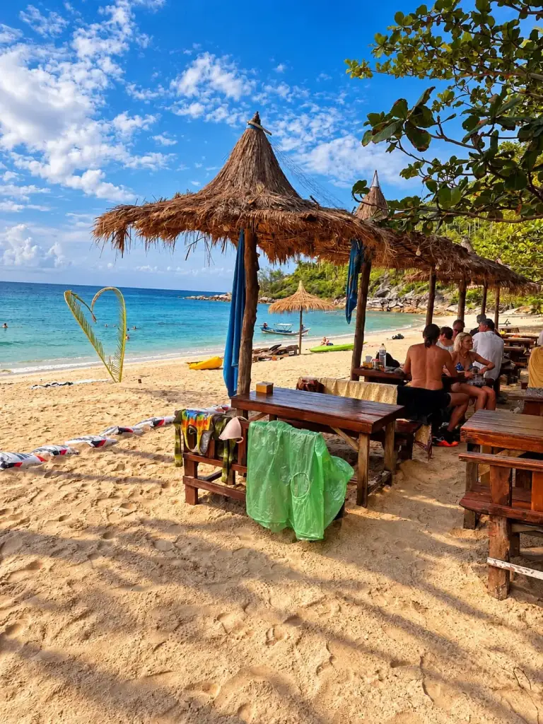Restaurant tables on the sand at Bottle Beach