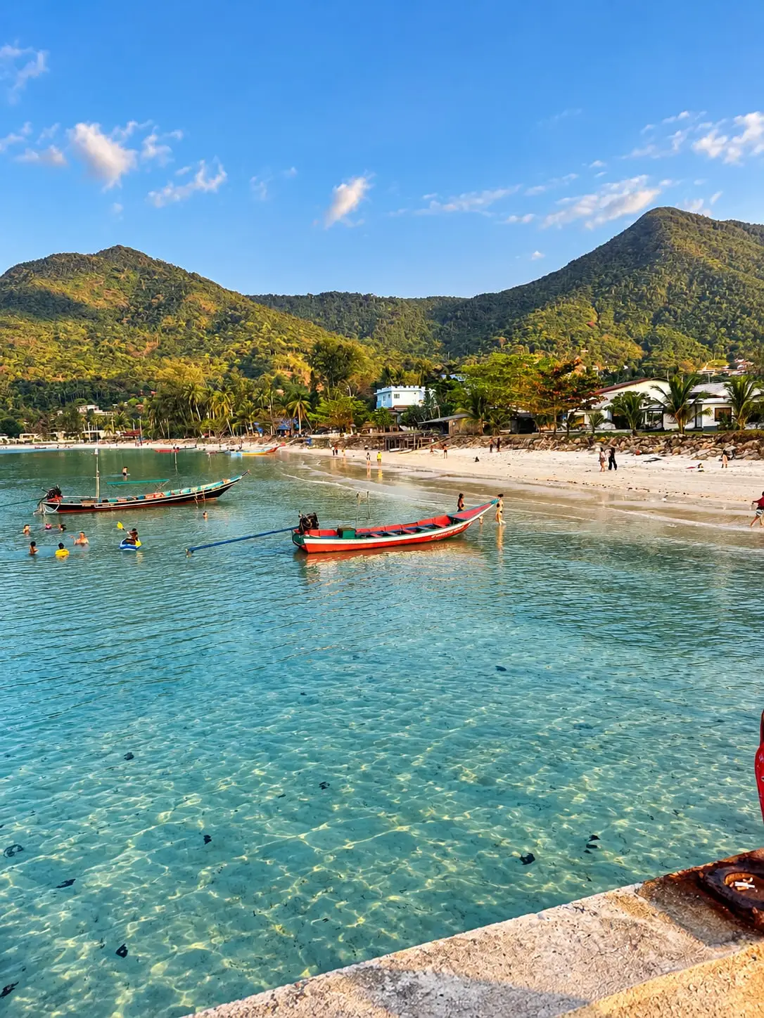Longtail boats in the bay at Bottle Beach, Koh Phangan