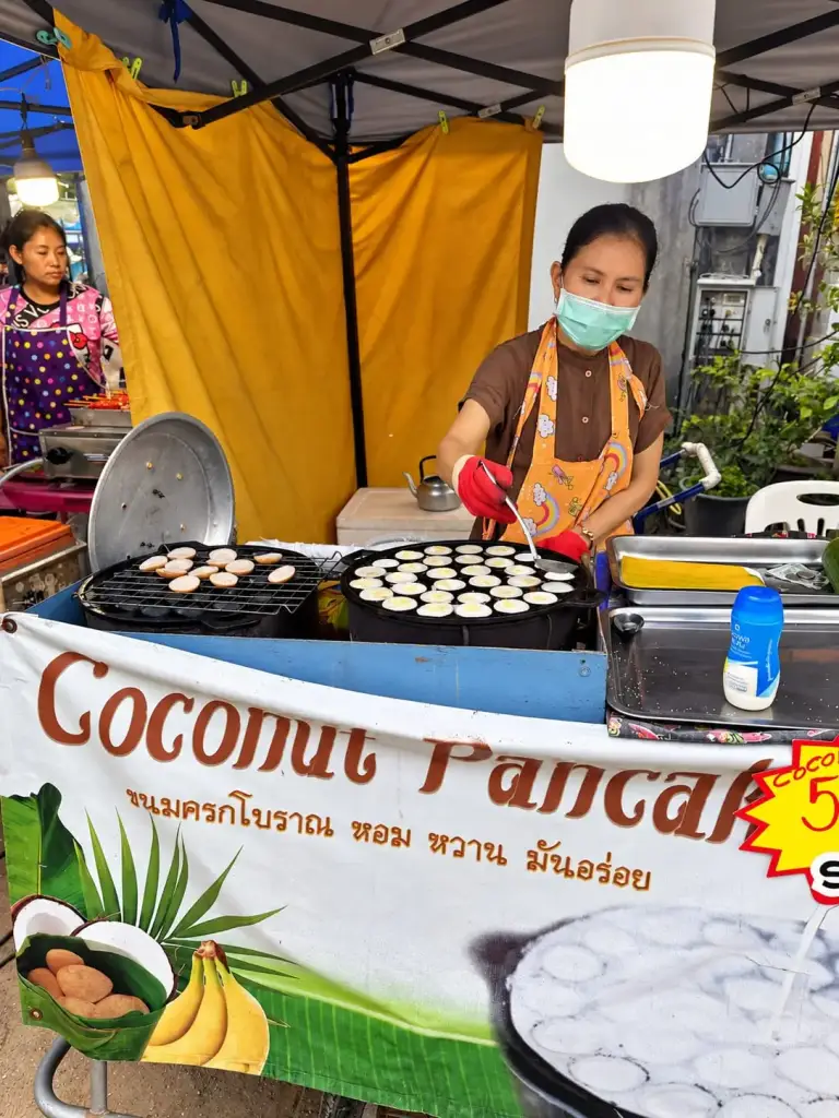 A coconut pancake stall at the Chaloklum Sunday market