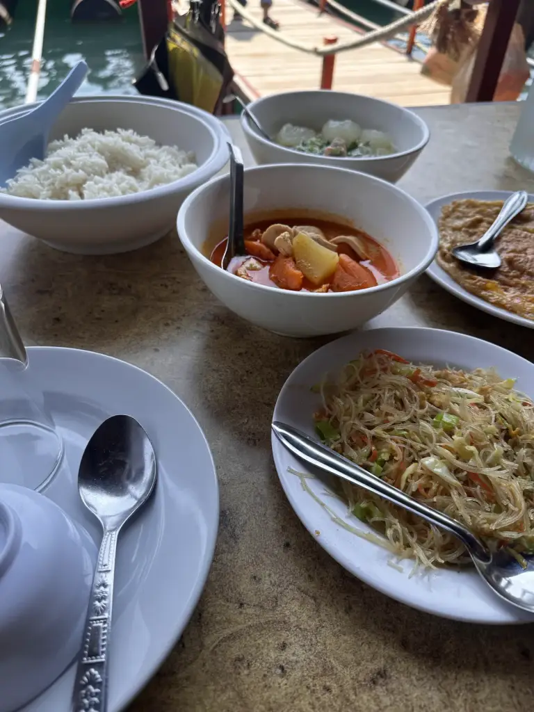 Shared lunch at a raft house on Cheow Lan Lake