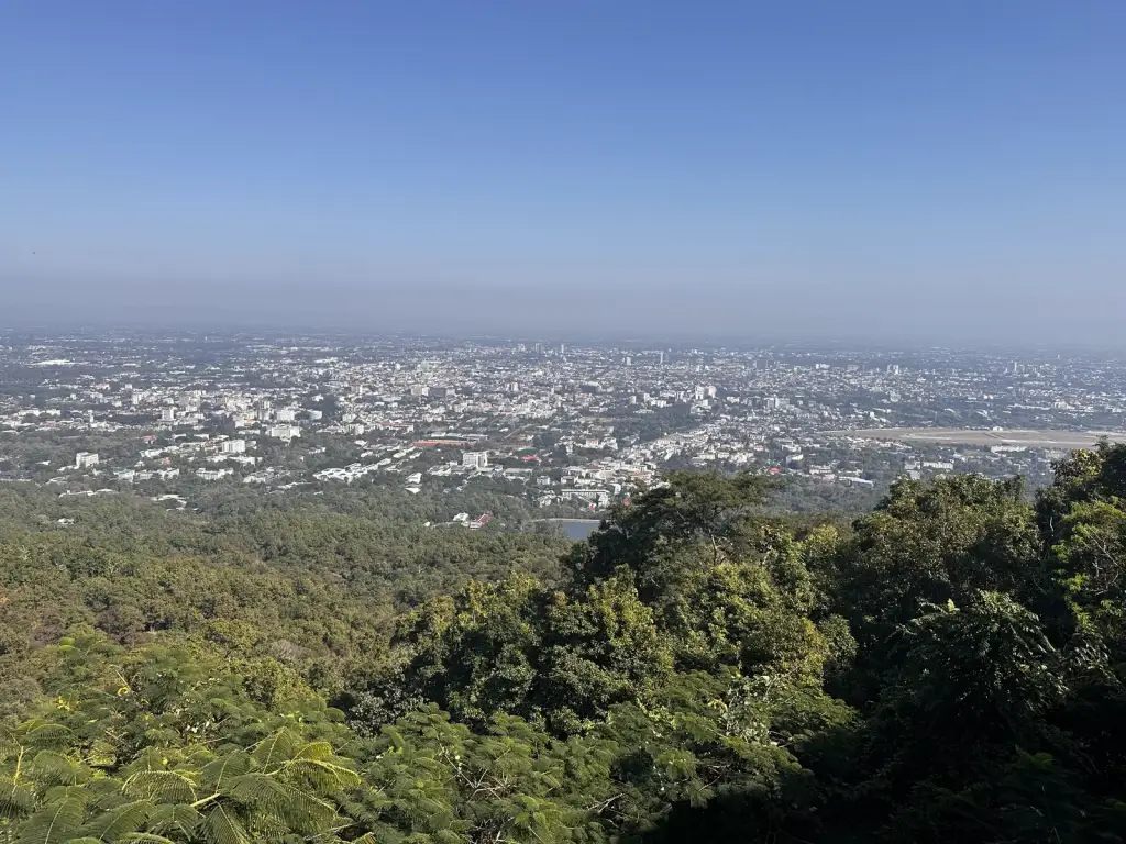 A view from above over the city of Chiang Mai and the green area around it