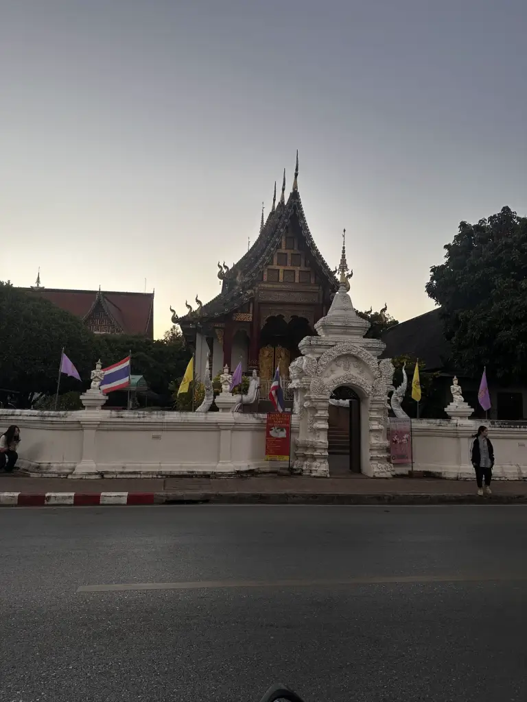A temple behind a white wall in Chiang Mai
