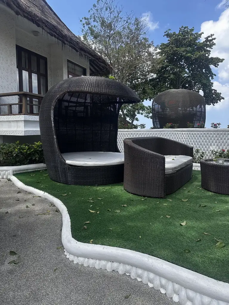 Woven seating pods on the lawn at Clear View Resort