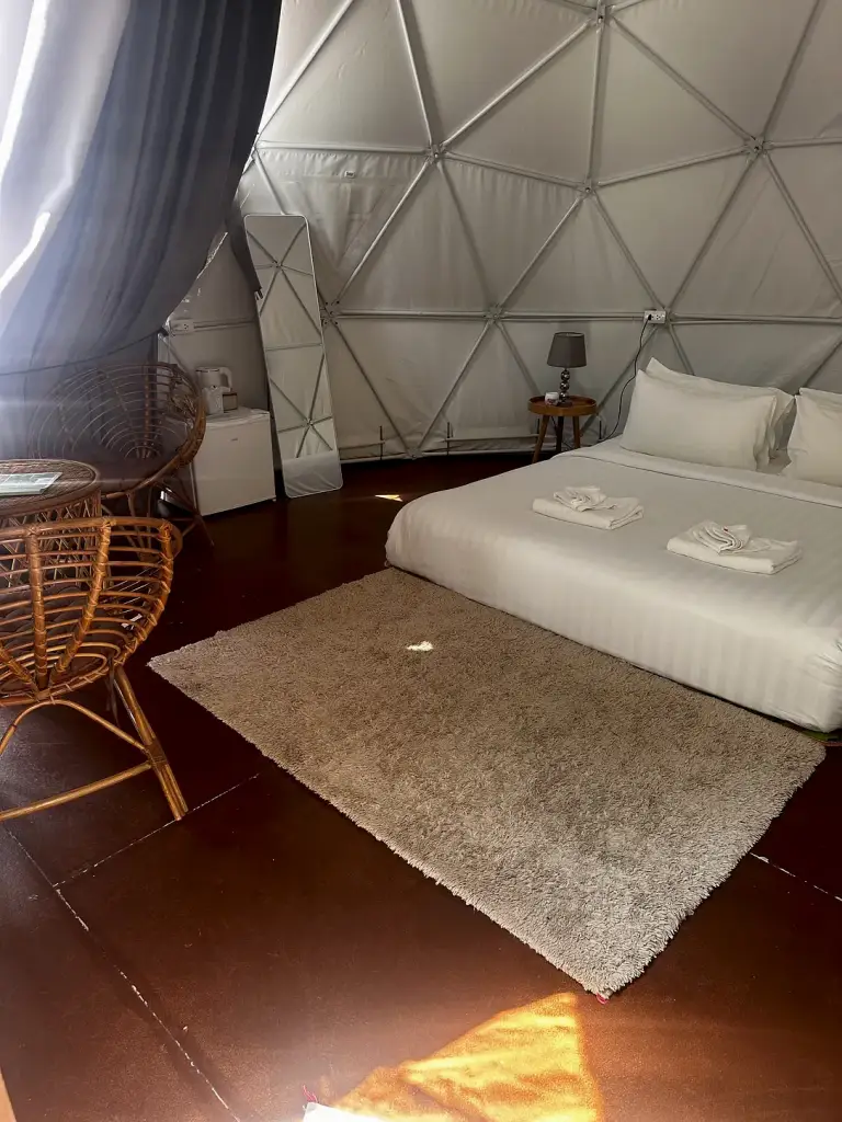 A double bed inside the dome tent at Cosy Garden Khao Sok