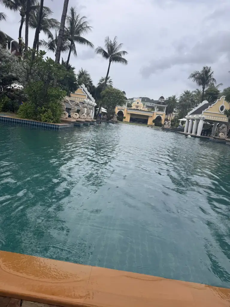 The main pool at Phuket Graceland and the European-style buildings