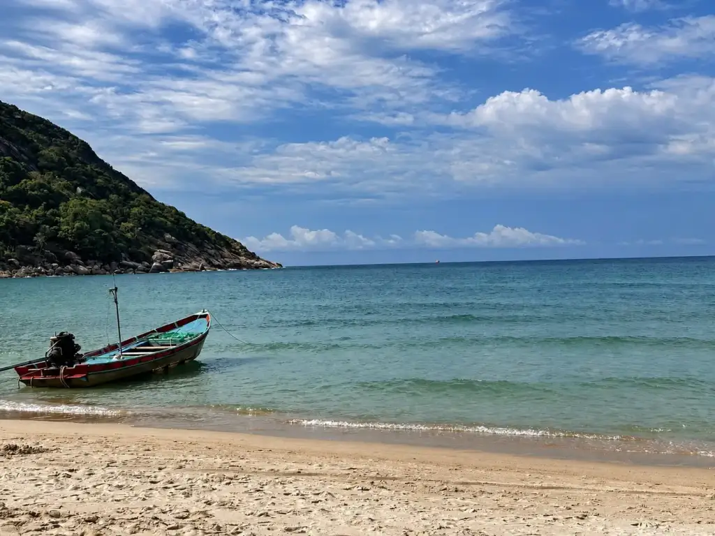Longtail boat on the beach at Bottle Beach, Koh Phangan