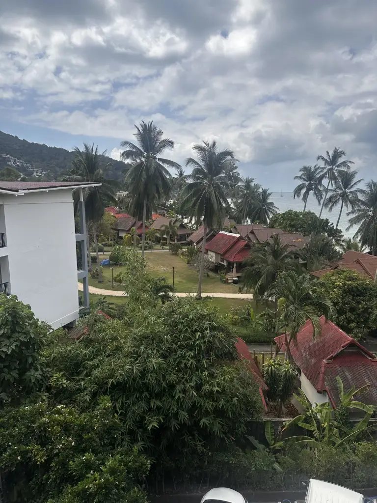 View from the balcony at Haad Yao Bayview over the gardens, the bungalows and the sea