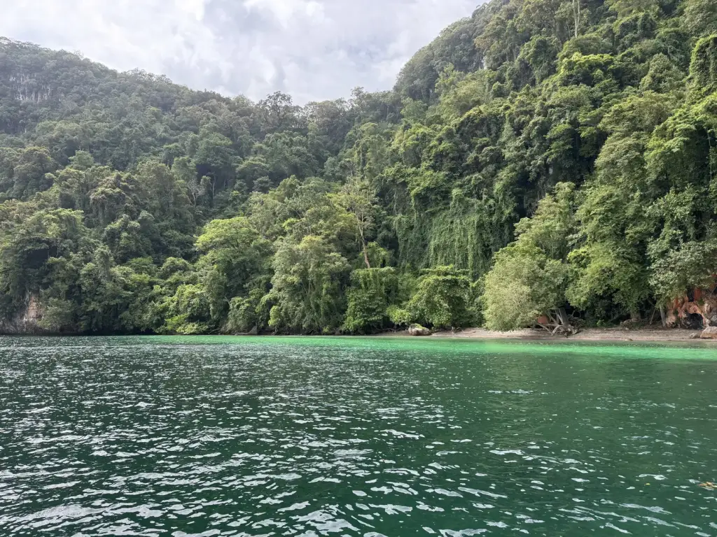 Green water and jungle-covered cliffs in the Hong Islands, Krabi