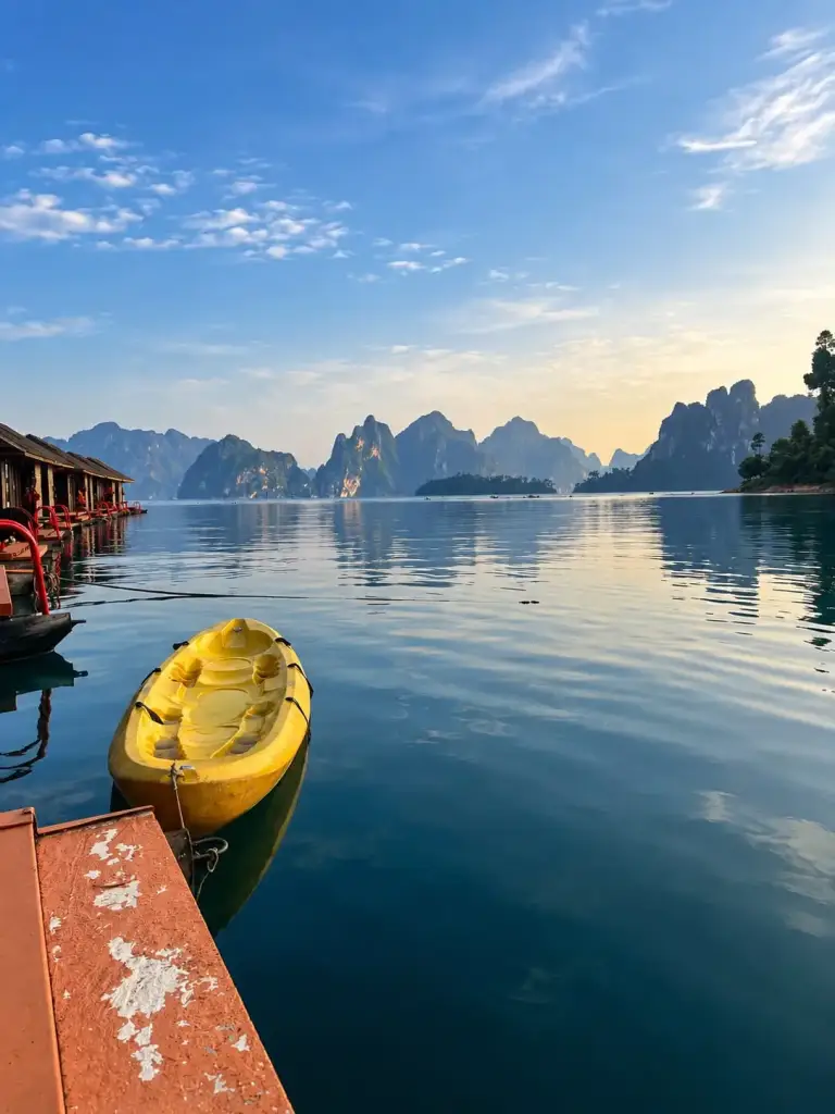 Cheow Lan Lake in Khao Sok, limestone cliffs and a yellow kayak