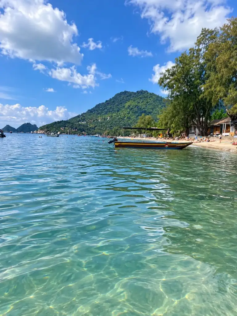 A boat in a bay on Koh Tao