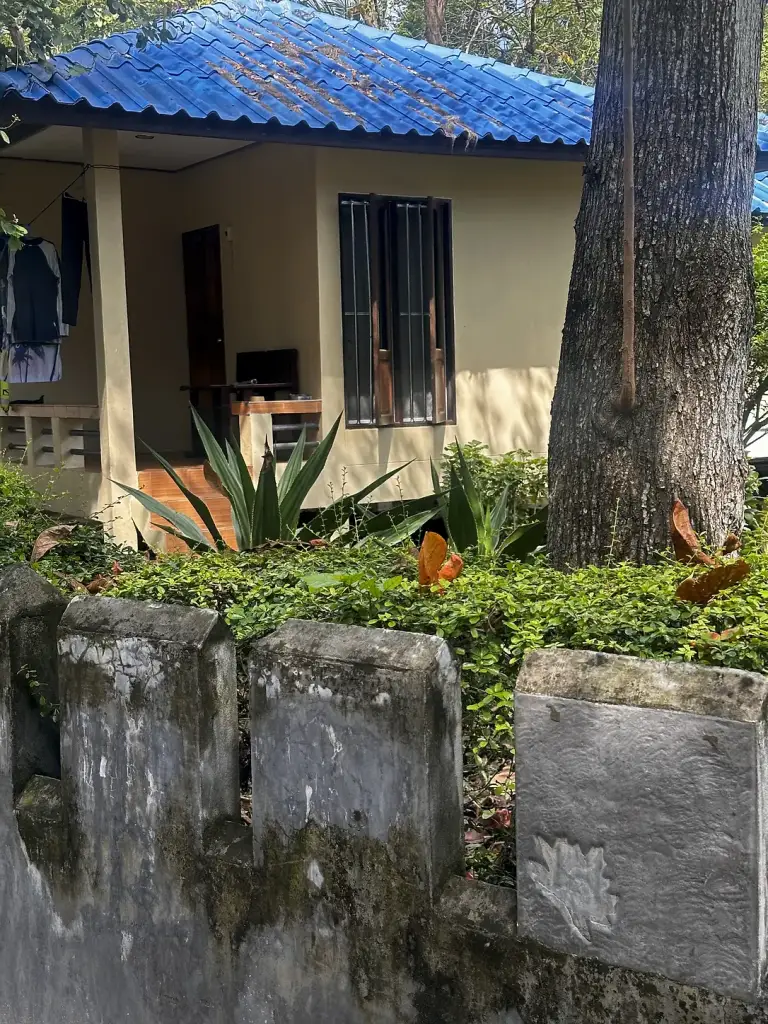 A blue-roofed bungalow at Nat Resort, Sairee