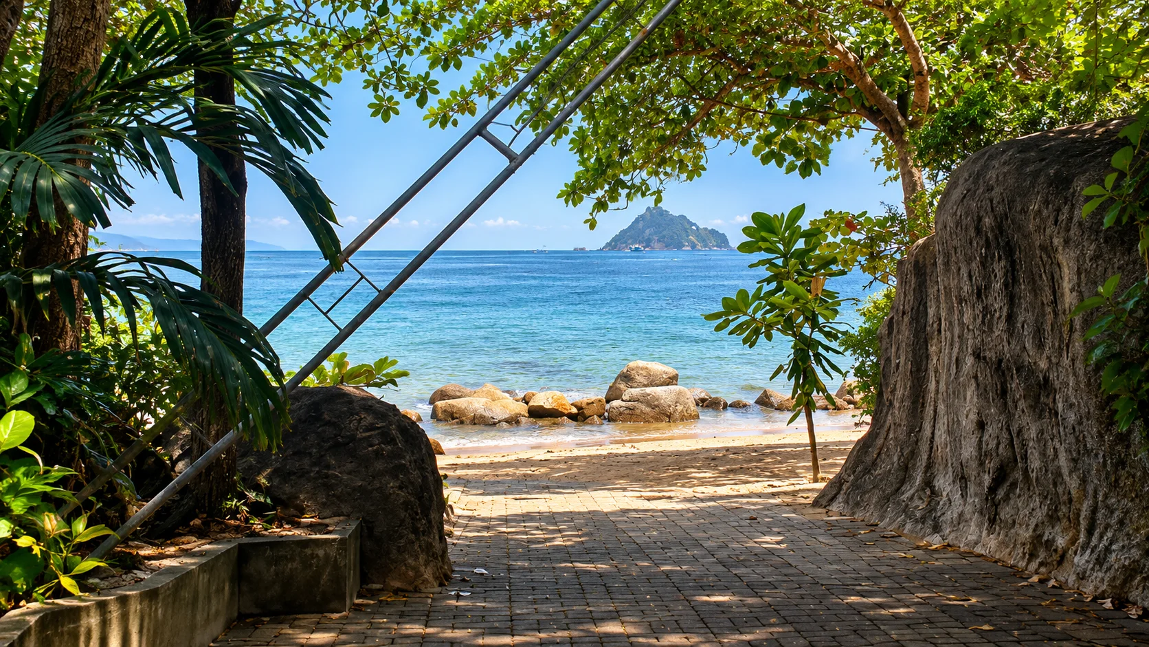 Path between the rocks down to the sea at Ocean View Resort, Koh Tao