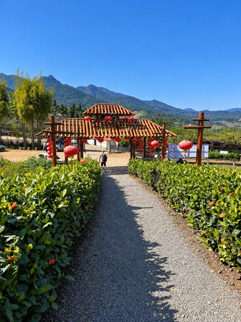 A path and a Chinese-style pavilion in Santichon Village, Pai