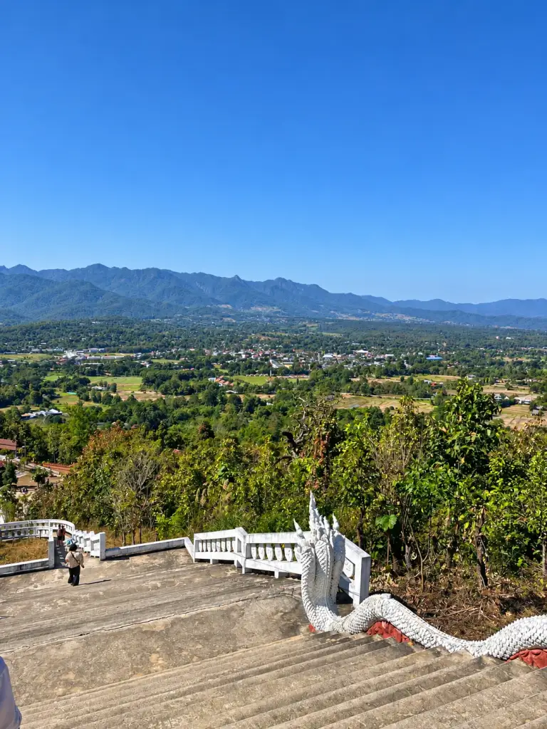 The White Buddha staircase and the view over the Pai valley