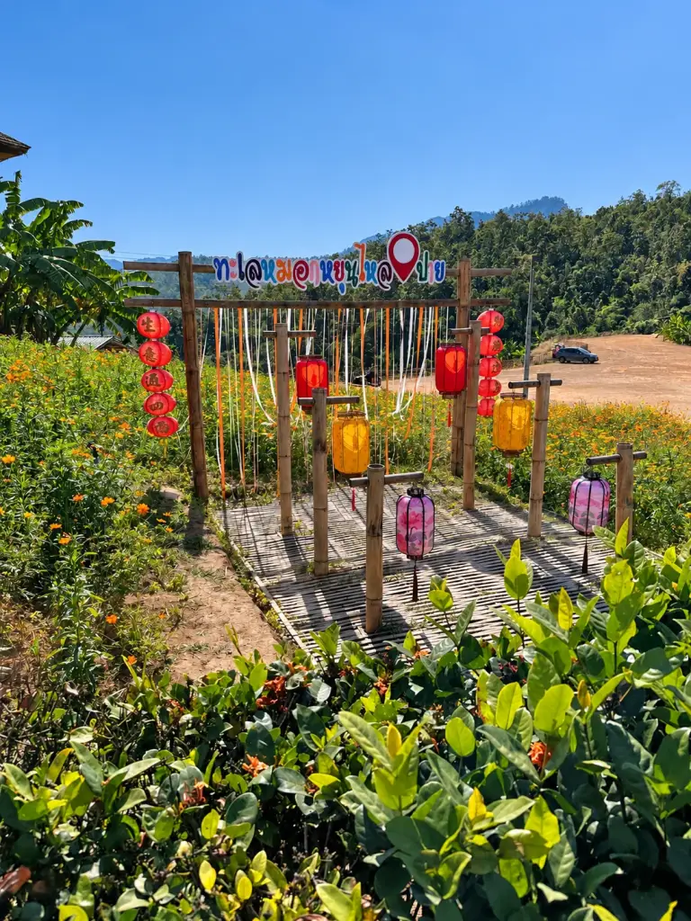 Red lanterns and flags at Yun Lai Viewpoint in Pai