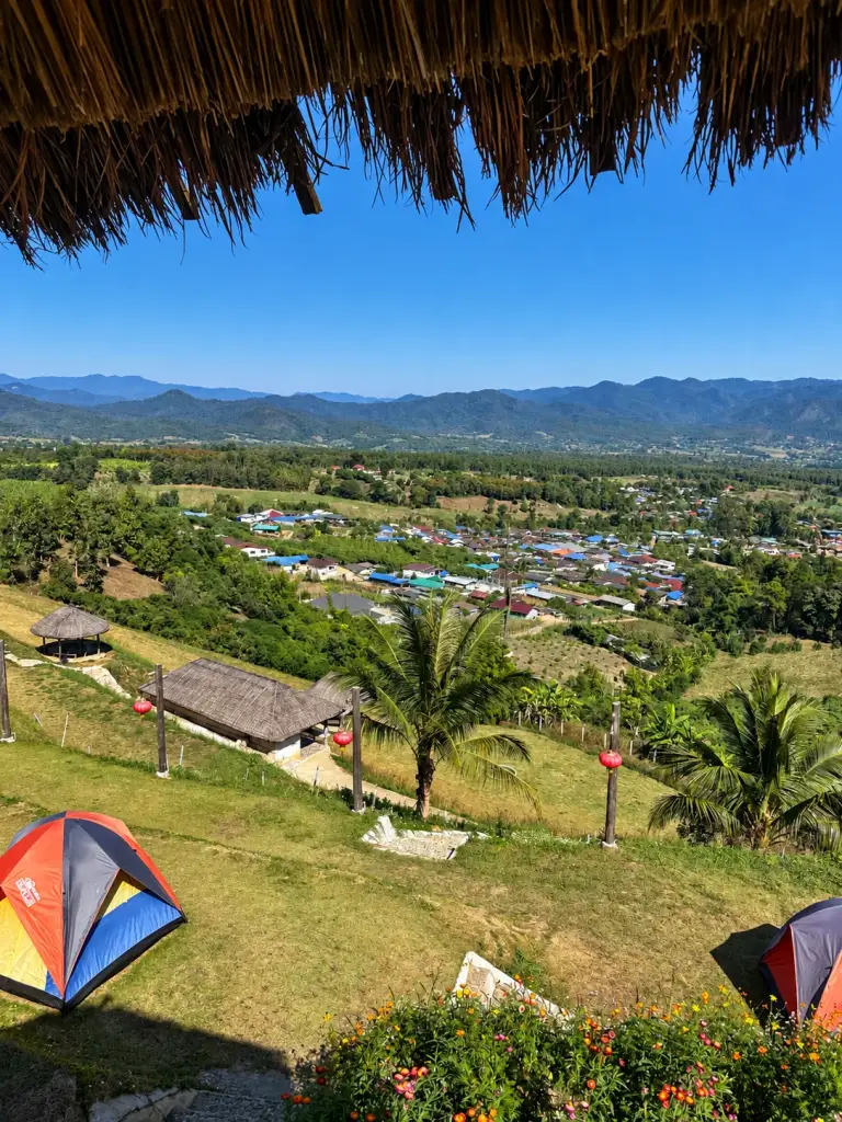 Yun Lai Viewpoint above the Pai valley, with shelters and tents