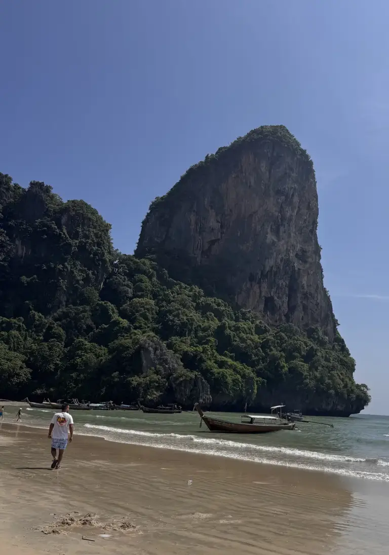 The beach at Railay and the limestone cliff above it