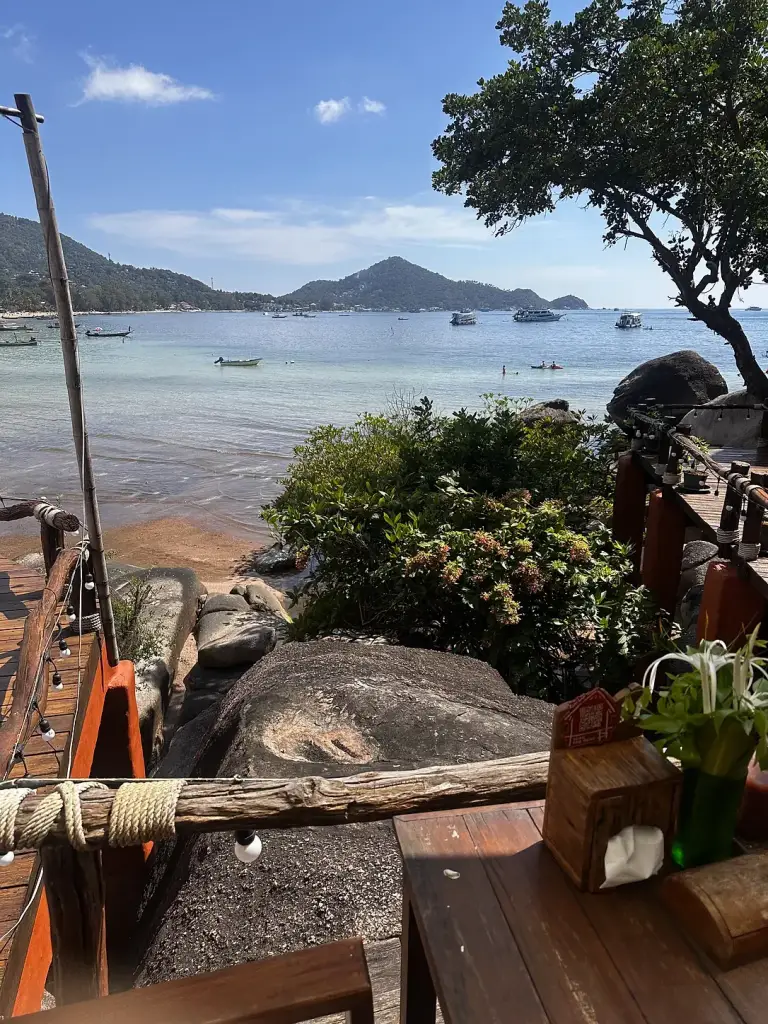 A wooden table above the granite boulders at Rim Lae
