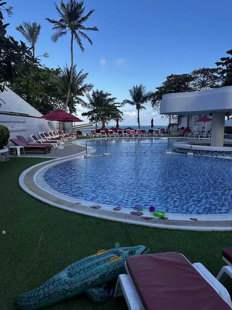 The pool with the beach behind it - Chaba Samui Resort (MATCHA), Koh Samui