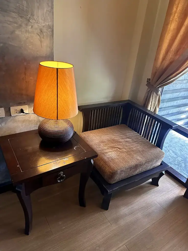 Seating area and lamp in the room at Seashell Resort, Koh Tao
