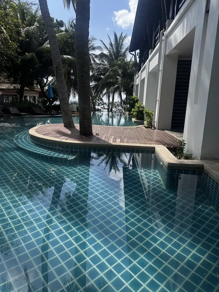 Another pool among the greenery at Seashell Resort, Koh Tao, with the sea in the background