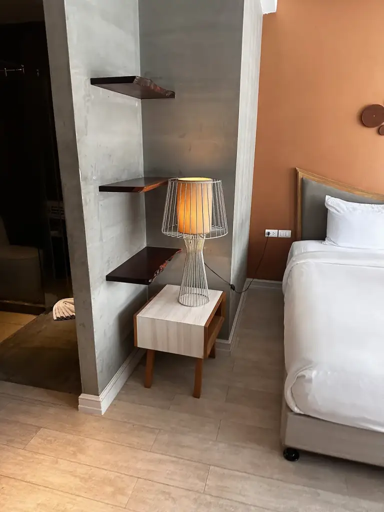 The design detail beside the bed at The Tarna Align Resort